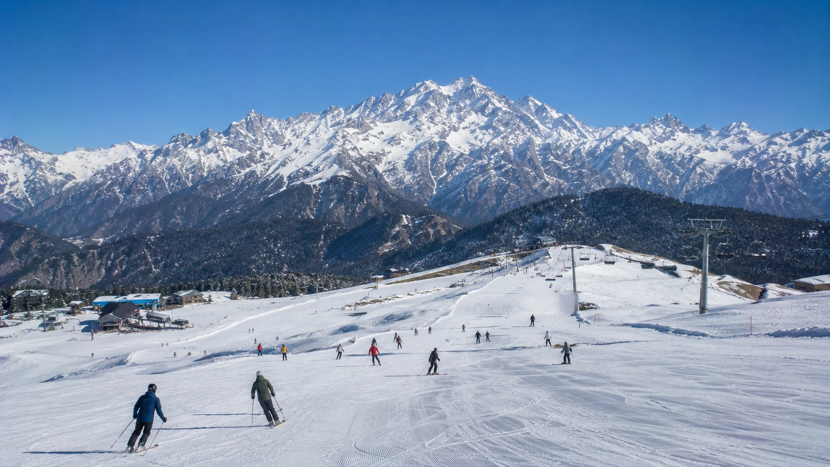 Scenic winter slopes at Auli Ski Resort with Nanda Devi peak in Uttarakhand