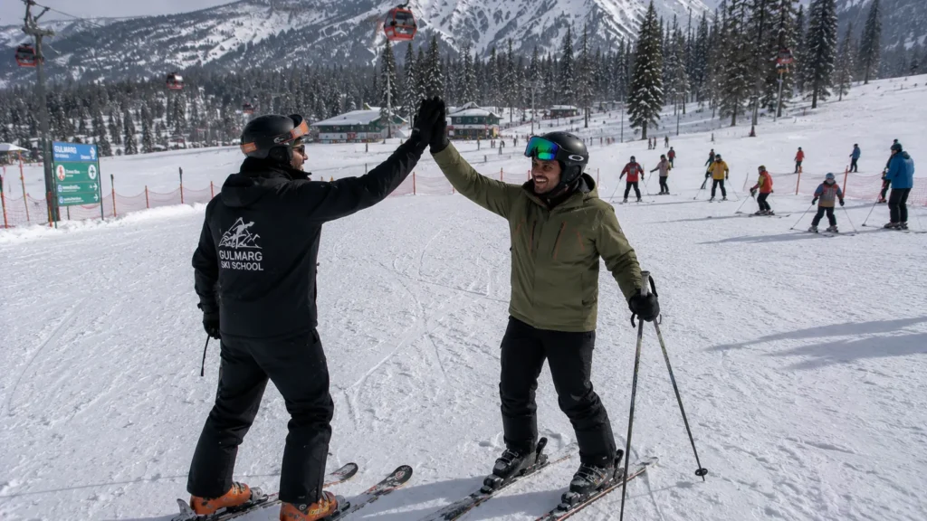 A beginner skier high-fiving their safety instructor after a successful ski run
