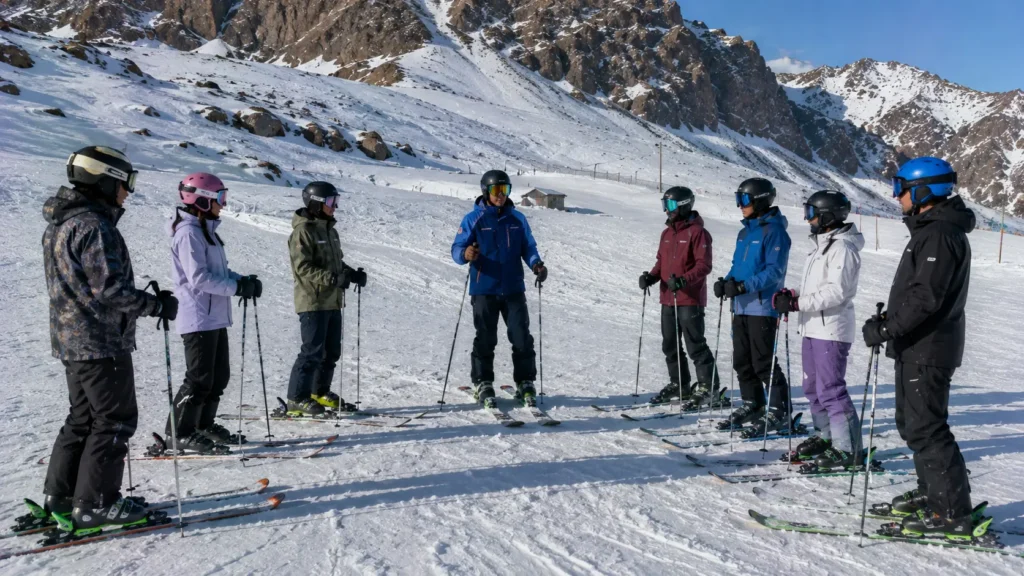 Ski students gathering for their morning lesson briefing in Gulmarg
